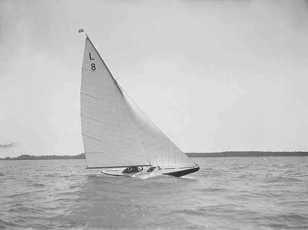 The 6 Metre Scotia IV sailing upwind on a fine day, 1913. Creator: Kirk & Sons of Cowes
