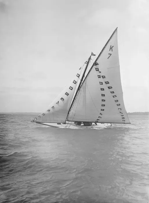 Framed Print : The 7 Metre Ginerva (K7) under sail with prize flags, 1912. Creator: Kirk & Sons of Cowes Framed Print : The 7 Metre Ginerva (K7) under sail with prize flags, 1912. Creator: Kirk & Sons of Cowes