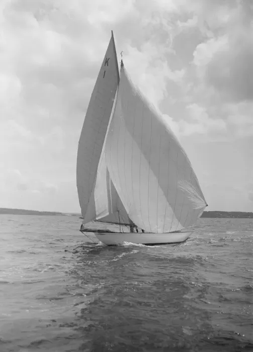 Framed Print : The 7 Metre Marsinah (K1) sailing with spinnaker, 1912. Creator: Kirk & Sons of Cowes