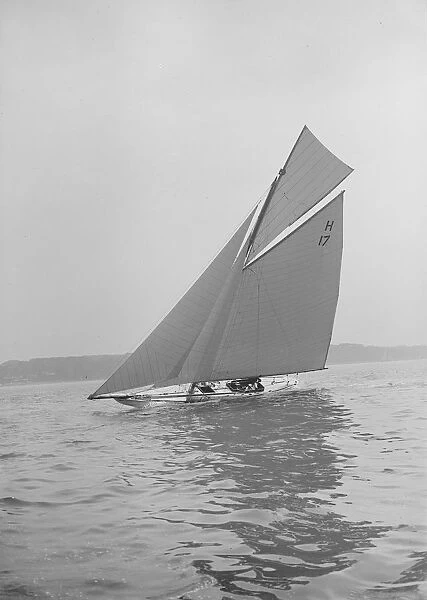 The 8 Metre Ierne sailing close-hauled, 1913. Creator: Kirk & Sons of Cowes
