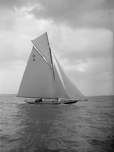 The 8 Metre Spero (H8) sailing upwind, 1912. Creator: Kirk & Sons of Cowes