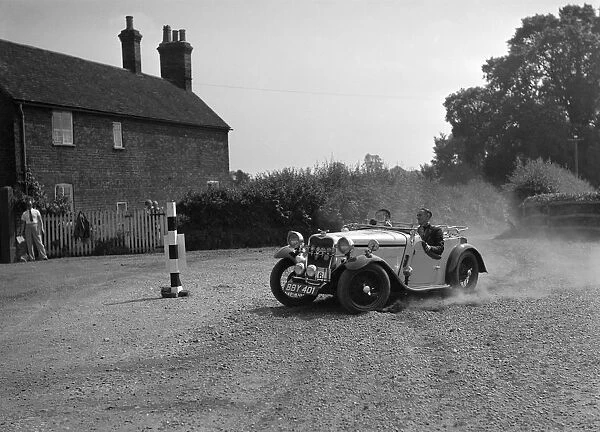 972 cc Singer competing in the Singer CC Rushmere Hill Climb, Shropshire 1935. Artist: Bill Brunell