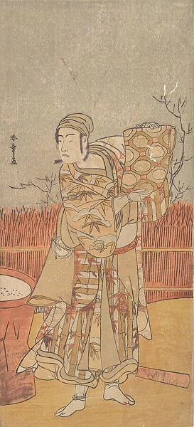 The Actor Sawamura Sojuro III Holding up a Piece of Brocade, late 18th century. Creator: Shunsho
