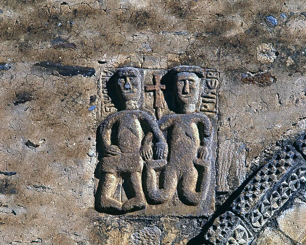 Adam and Eve before the Original Sin, bas-relief on the facade of the church