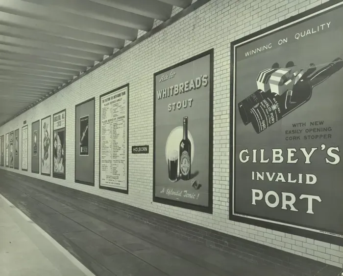 Framed Print : Advertisements for beer and port, Holborn Underground Tram Station, London, 1931 Framed Print : Advertisements for beer and port, Holborn Underground Tram Station, London, 1931