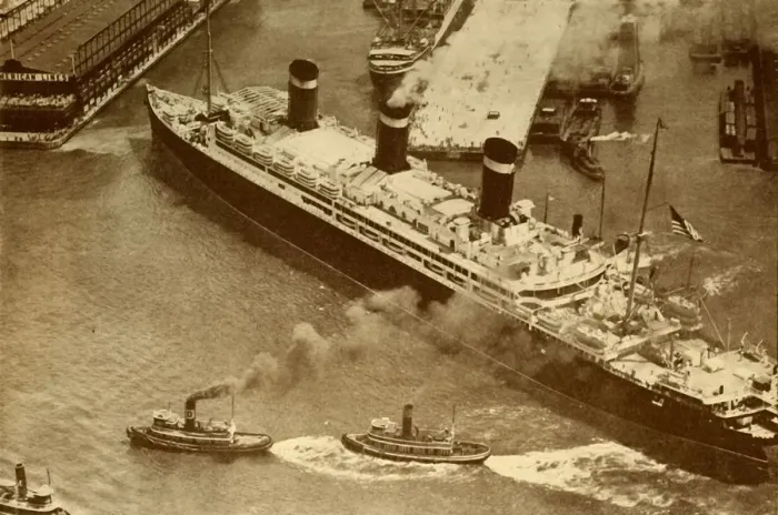 Framed Print : An Aerial Photograph of the Leviathan Being Towed By Small Tugs Into Framed Print : An Aerial Photograph of the Leviathan Being Towed By Small Tugs Into