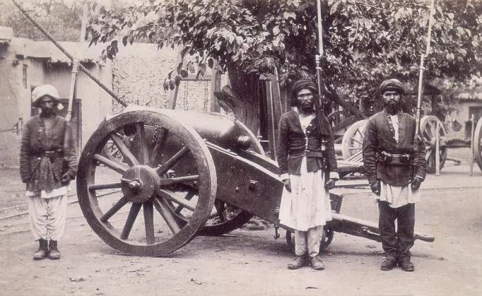 Framed Print : Three Afghan soldiers standing next to a cannon, Afghanistan, 1880s. Creator: Unknown Framed Print : Three Afghan soldiers standing next to a cannon, Afghanistan, 1880s. Creator: Unknown