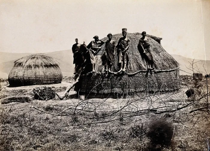 Framed Print : Africa: a group of African people standing on a kraal hut, between 1800 and 1899. Creator: Unknown Framed Print : Africa: a group of African people standing on a kraal hut, between 1800 and 1899. Creator: Unknown