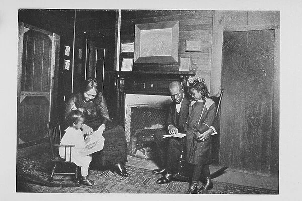 An African American family; Reading books, 1922. Creator: Unknown