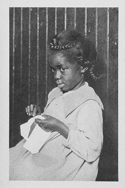 An African American girl; Caroline's play, 1922. Creator: Unknown