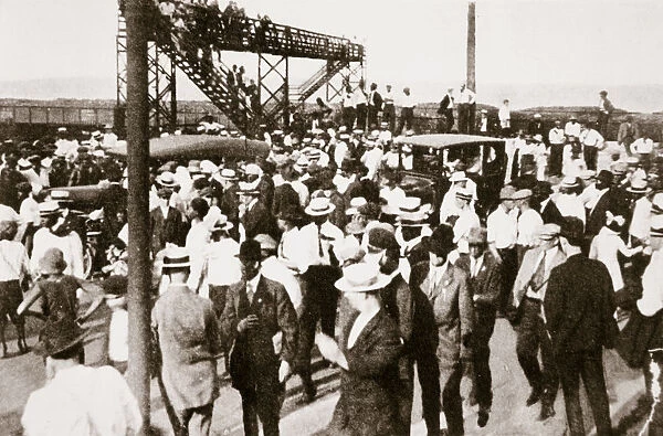 African Americans and whites leaving the beach as trouble begins, Chicago, Illinois, USA, c1919