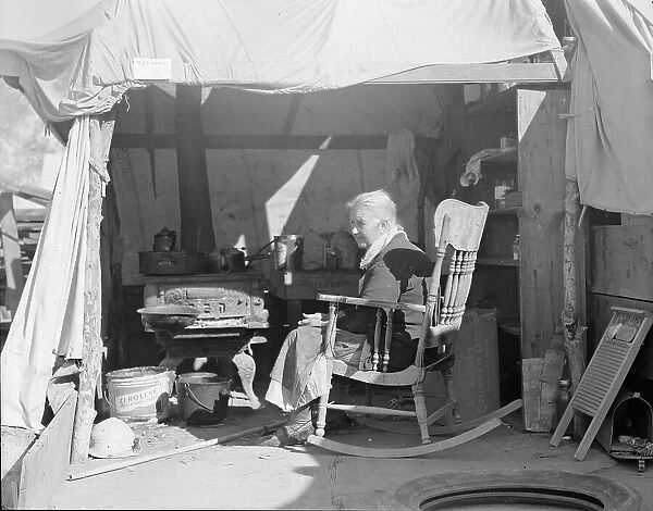 Aged woman from Oklahoma, Kern County migrant camp, California, 1936. Creator: Dorothea Lange