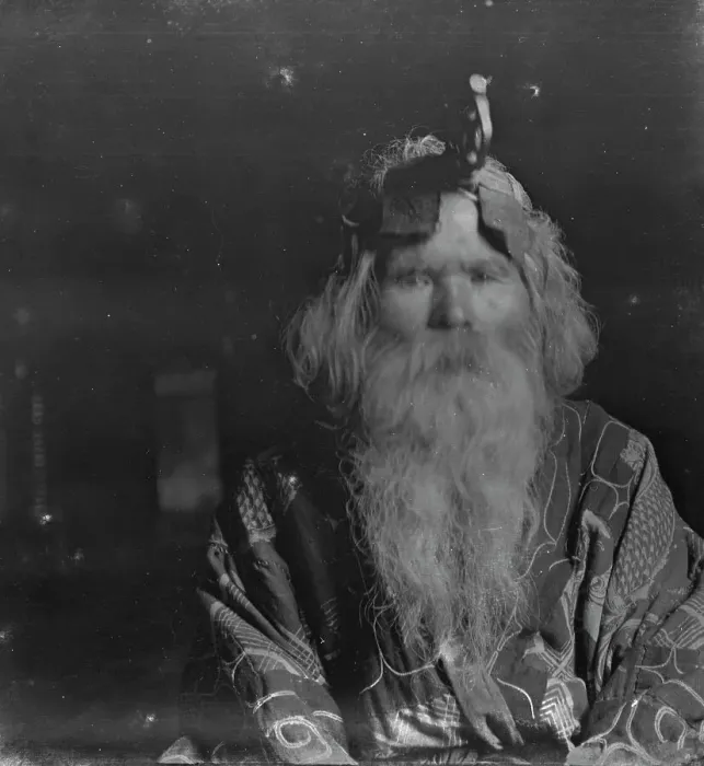 Framed Print : Ainu chief wearing a headdress, 1908. Creator: Arnold Genthe Framed Print : Ainu chief wearing a headdress, 1908. Creator: Arnold Genthe