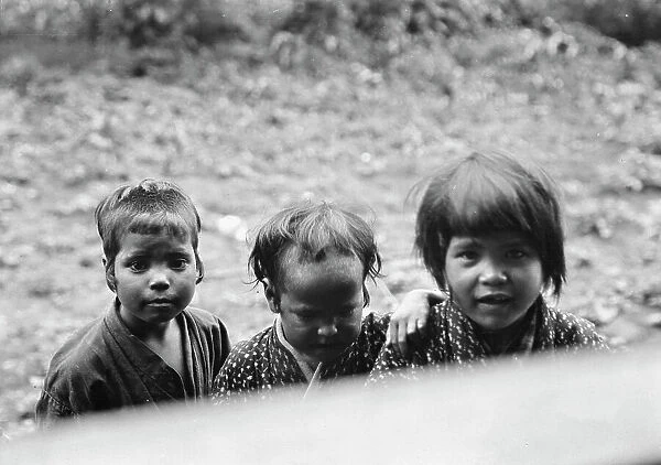 Three Ainu children, 1908. Creator: Arnold Genthe