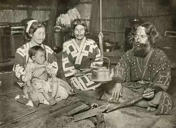 Framed Print : Ainu Man and Women at Home, 1910. Creator: Herbert Ponting Framed Print : Ainu Man and Women at Home, 1910. Creator: Herbert Ponting