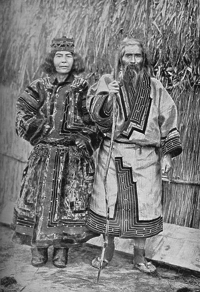An Ainu and his wife, Japan, 1902. Artist: Kajima & Suwo
