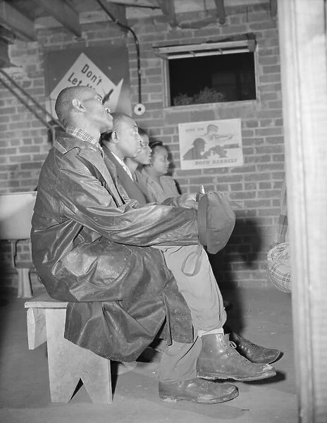Air raid wardens attending a meeting in their headquarters, Washington, D. C. 1943. Creator: Gordon Parks