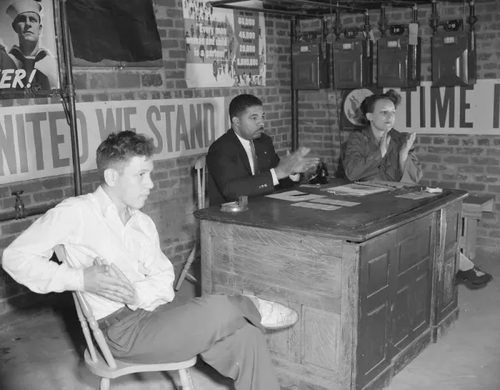 Framed Print : Air raid wardens meeting in zone nine, Southwest area, Washington, D. C, 1942. Creator: Gordon Parks Framed Print : Air raid wardens meeting in zone nine, Southwest area, Washington, D. C, 1942. Creator: Gordon Parks