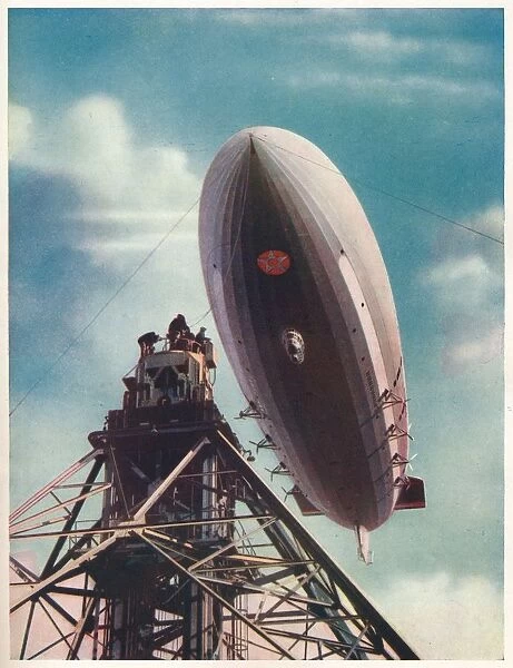 The US airship Macon being moored to the mobile mast at Lakehurst, New Jersey, c1935 (c1937)