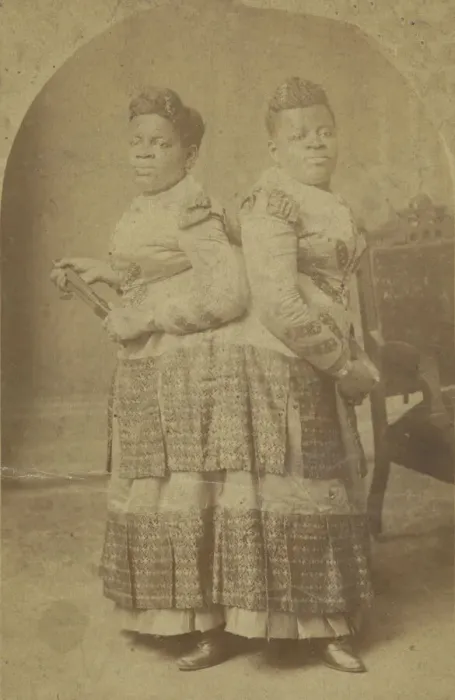 Framed Print : Albumen print of Millie and Christine McCoy, 1880s -1890s. Creator: Charles Eisenmann Framed Print : Albumen print of Millie and Christine McCoy, 1880s -1890s. Creator: Charles Eisenmann