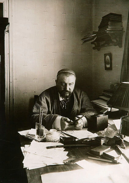 Alexander Kuprin, Russian author, at his desk, Gatchina, Russia, early 20th century. Artist: Karl Karlovich Bulla