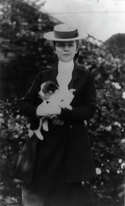 Framed Print : Alice Roosevelt in riding clothes, with dog, c1902 June 17. Creator: Frances Benjamin Johnston Framed Print : Alice Roosevelt in riding clothes, with dog, c1902 June 17. Creator: Frances Benjamin Johnston