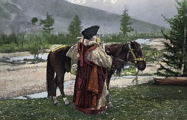 Altai Woman in National Costume (Hat: Kuaraan Boruk, Sheepskin Coat: Ton, Sleeveless... 1911-1913. Creator: Sergei Ivanovich Borisov)