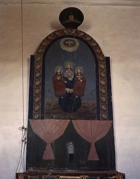 An altar in the church dedicated to the Trinity, Trampas, N. M. 1943. Creator: John Collier