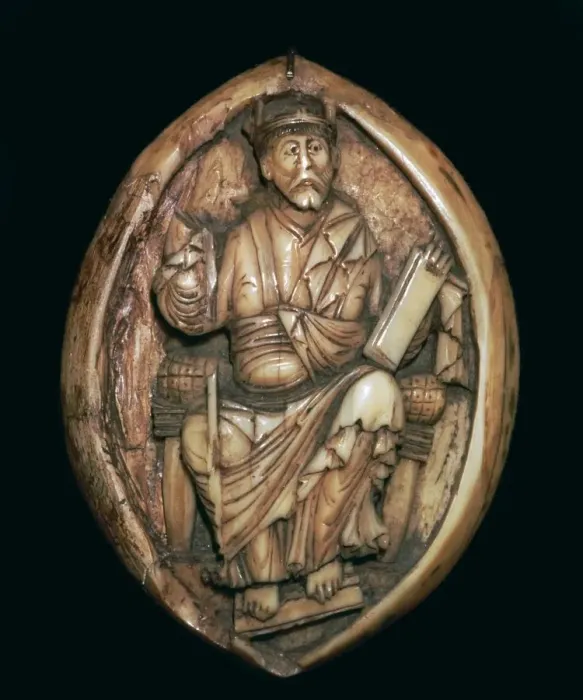 Framed Print : Anglo-Saxon carving of a man writing a book, 10th century Framed Print : Anglo-Saxon carving of a man writing a book, 10th century