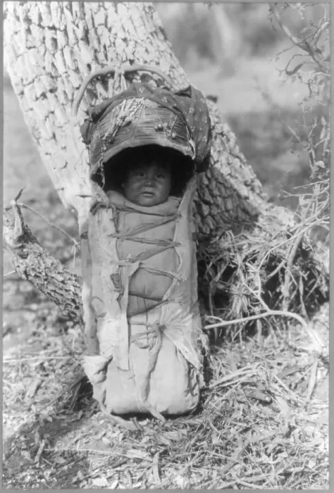 Framed Print : Apache babe in carrier, c1903. Creator: Edward Sheriff Curtis Framed Print : Apache babe in carrier, c1903. Creator: Edward Sheriff Curtis
