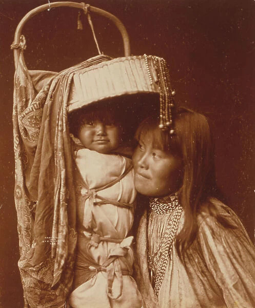 Apache girl and papoose, c1903. Creator: Edward Sheriff Curtis