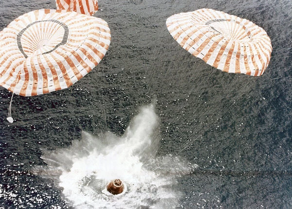 The Apollo 15 capsule lands safely despite a parachute failure, Mid-Pacific Ocean, 1971. Artist: NASA