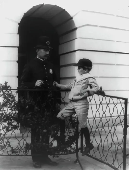 Framed Print : Archie Roosevelt and his friend the policeman, c1902. Creator: Frances Benjamin Johnston Framed Print : Archie Roosevelt and his friend the policeman, c1902. Creator: Frances Benjamin Johnston
