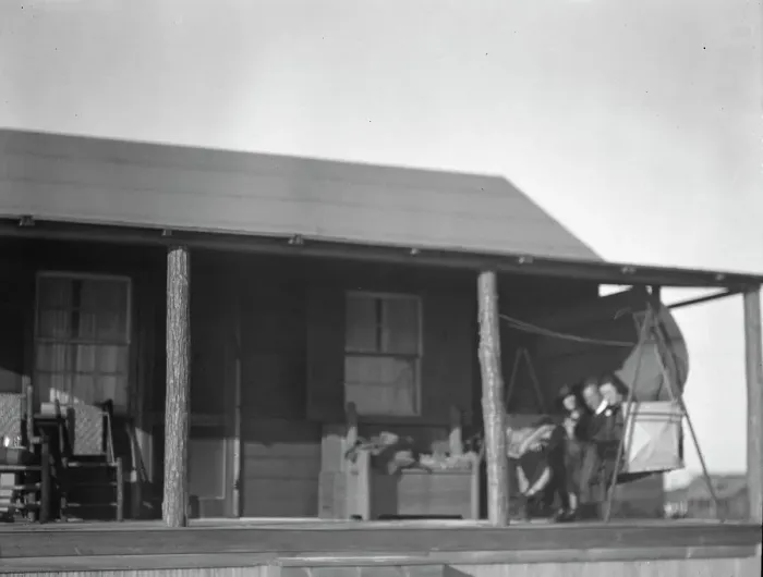 Framed Print : Arnold Genthe and two women friends seated on a swing on the porch of his...New York, c1911-c1942. Creator: Arnold Genthe Framed Print : Arnold Genthe and two women friends seated on a swing on the porch of his...New York, c1911-c1942. Creator: Arnold Genthe