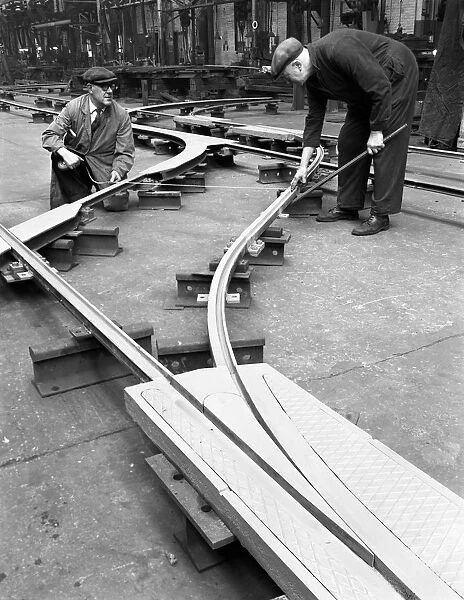 Assembling trackwork in an ICI factory, Sheffield, South Yorkshire, 1963. Artist