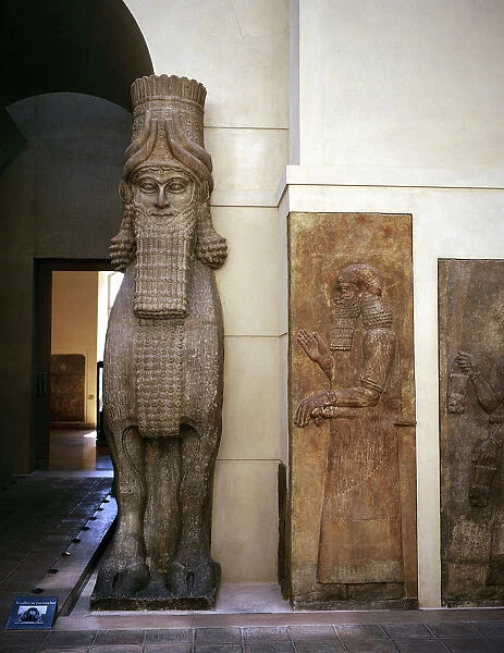 Assyrian sculpture of a human-headed winged bull at the palace gateway, Khorsabad, 8th century BC