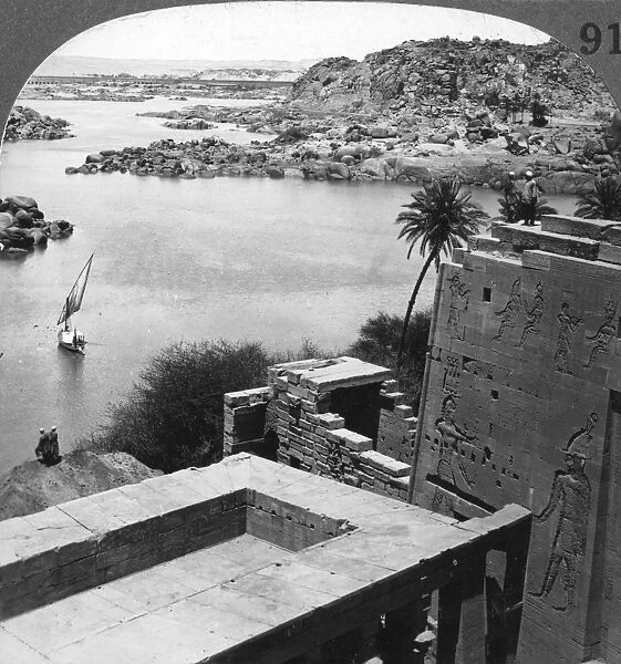 The Aswan dam as seen from the Philae temple, Egypt, 1905.Artist: Underwood & Underwood