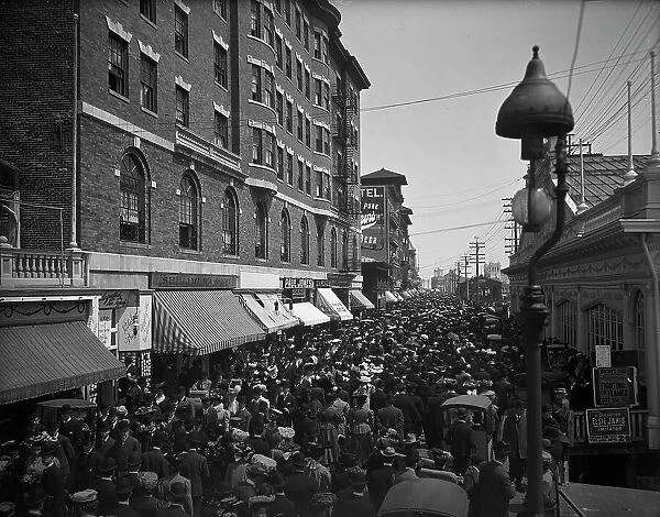 Atlantic City, N.J. the Boardwalk parade, between 1890 and 1906. Creator: Unknown