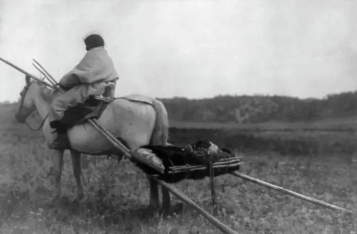 Framed Print : Atsina Indian on horse pulling travois, c1908. Creator: Edward Sheriff Curtis Framed Print : Atsina Indian on horse pulling travois, c1908. Creator: Edward Sheriff Curtis