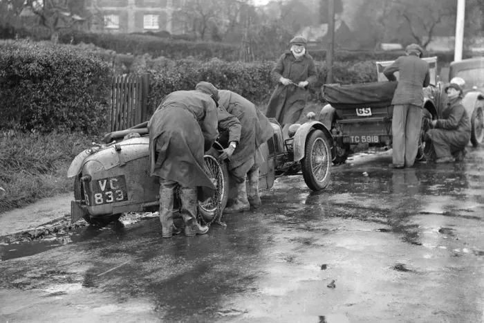Framed Print : Attaching snow chains to JE Lancasters Riley Brooklands during the Inter-Varsity Trial, 1930 Framed Print : Attaching snow chains to JE Lancasters Riley Brooklands during the Inter-Varsity Trial, 1930