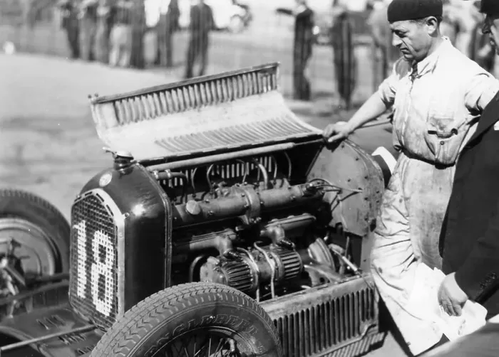 Framed Print : Attilio Marinoni, chief mechanic of Scuderia Ferrari, with an Alfa Romeo, 1934 Framed Print : Attilio Marinoni, chief mechanic of Scuderia Ferrari, with an Alfa Romeo, 1934