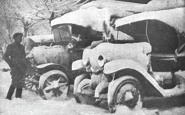 Au Volant; Camions sous la neige, 1916. Creator: Unknown