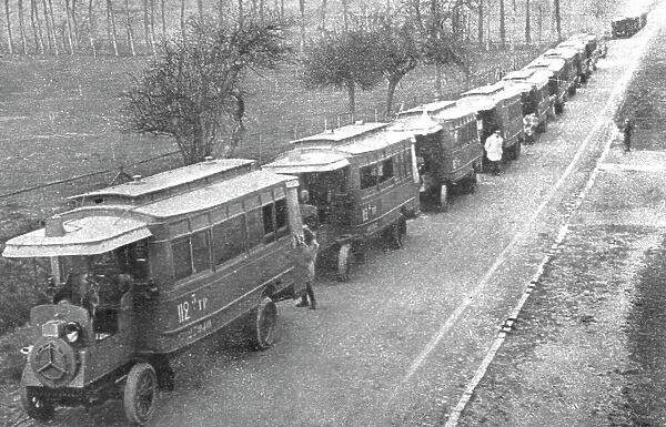 Au Volant; les autobus de Paris affectes aux transports de troupes, 1918. Creator: Unknown