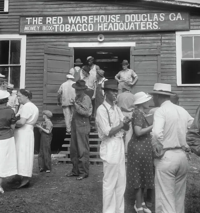Framed Print : As the auctioneer knocks down the last bid on each basket of tobacco... Douglas, Georgia, 1938. Creator: Dorothea Lange Framed Print : As the auctioneer knocks down the last bid on each basket of tobacco... Douglas, Georgia, 1938. Creator: Dorothea Lange