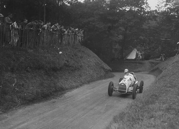 Austin competing in the Shelsley Walsh Amateur Hillclimb, Worcestershire, 1929. Artist
