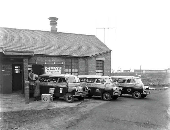 Framed Print : Austin vans being loaded outside Clays TV repair depot, Mexborough, South Yorkshire, 1959 Framed Print : Austin vans being loaded outside Clays TV repair depot, Mexborough, South Yorkshire, 1959