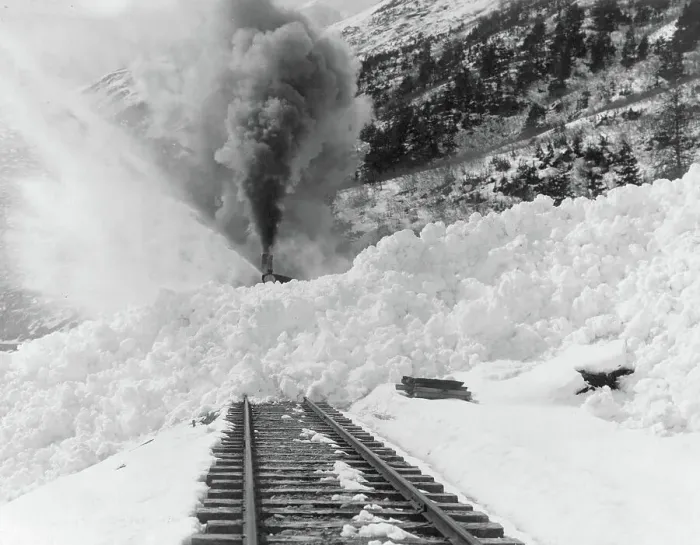 Framed Print : Avalanche of snow across railroad tracks, between 1890 and 1930. Creator: Frank G. Carpenter