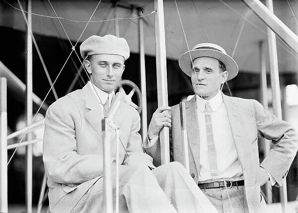 Aviator Harry Atwood, in Plane with Leo Stevens, 1911. Creator: Harris & Ewing. Aviator Harry Atwood, in Plane with Leo Stevens, 1911. Creator: Harris & Ewing