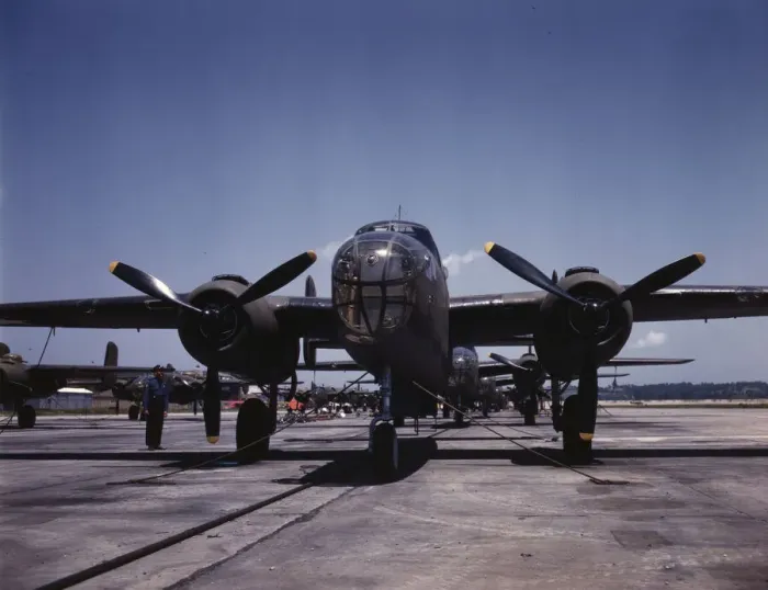 Framed Print : B-25 bombers on the outdoor assembly line at North American Aviation... Kansas City, Kansas, 1942. Creator: Alfred T Palmer Framed Print : B-25 bombers on the outdoor assembly line at North American Aviation... Kansas City, Kansas, 1942. Creator: Alfred T Palmer