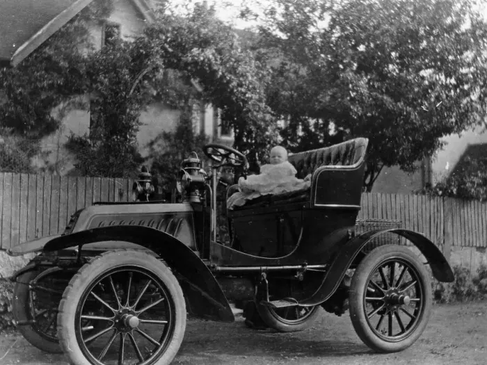 Framed Print : A baby on the seat of a De Dion Bouton car, 1903 Framed Print : A baby on the seat of a De Dion Bouton car, 1903